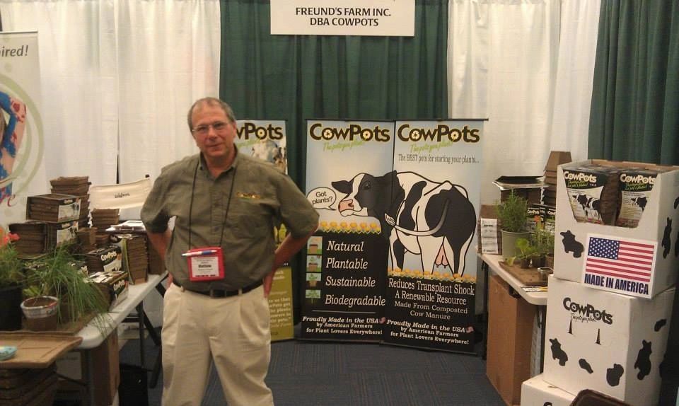 CowPots booth display at Garden Writers Association trade show